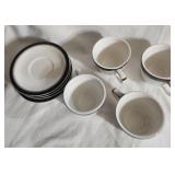 Four Buffalo China cups and saucers.  White with