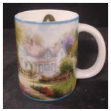 Thomas Kinkade AMCAL coffee mug featuring the