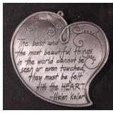 Pewter heart-shaped ornament features a quote by