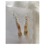 Costume earrings with topaz colored beads. Gold