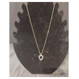 Heart charmed gold tone necklace