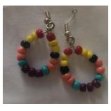 Costume earrings with multi colored beads. Silver