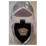 Cushion cut style ring with double halo setting.