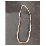 Silver colored beaded necklace
