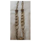 Liz Claiborne  gold tone necklace with ball