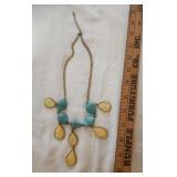 Gold tone necklace with turquoise haulite beads