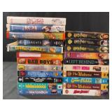 VHS tapes including Harry Potter, Charlie Brown