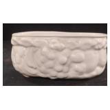 Vintage white milk glass planter featuring a