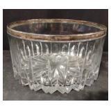 Vintage Italian glass with a silver-plated rim.