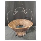Woven wicker and wrought iron basket