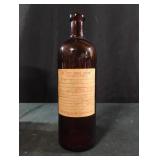 Vintage amber-brown glass apothecary jar with The