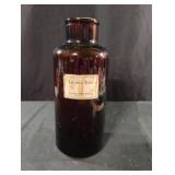Vintage amber-brown glass apothecary jar with a