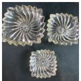Three different size glass trays