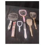 Handheld mirrors and brushes