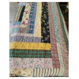 Vintage reversible handmade quilt. Has spots. 82
