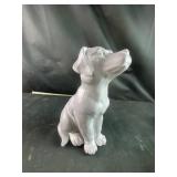 Grey dog statue