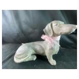 Wiener dog statue with pink bow