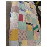 Vintage handmade reversible quilt 64 x 84. Has