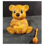 Vintage brown ceramic honey bear pot with a
