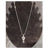 Silver colored pendant necklace