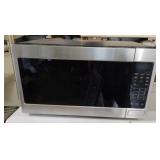 Thermador over the stove microwave. Works