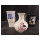Mickey Mouse mugs and a vase