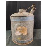 vintage galvanized metal oil can