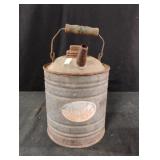 vintage galvanized metal oil can