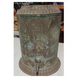 Vintage metal water dispenser with lid. Spout