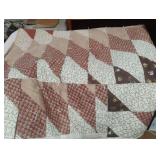 Handmade reversible quilt. Has spots. 74 x 96