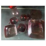 Ruby red glass plates cups and vase