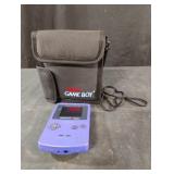 Vintage Nintendo Game Boy Color and bag. Powers