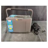 Epson Picture Mate. Powers on