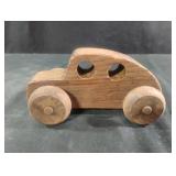 Hand carved wooden car