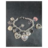 925 Charm Bracelet with Heart Charms - some charms