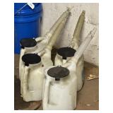 4 oil dispensing jugs
