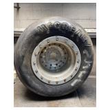 McCreary 25.5/10.0-13GTW wheel bent on back