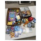 Box of Pokï¿½mon Cards / Action Figures / Handbook