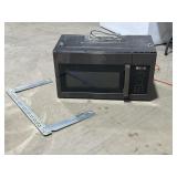 GE Above Range Microwave (powers on)