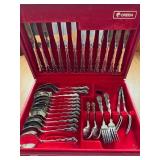 Vintage Oneida six place cutlery set in Red case