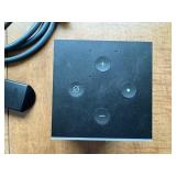Amazon fire cube, cables, and remote