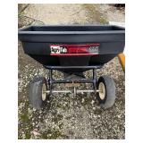 Pull behind seed spreader, hose reel, etc