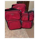 Red Luggage with wheels