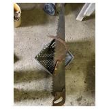 Antique saw, grinding wheel,  sickle
