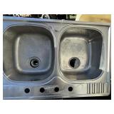 Stainless 2 well drop in sink with Moen faucet
