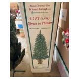 4.5 foot Christmas spruce pre-lit in planter
