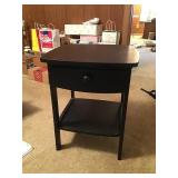 Black wooden nightstand