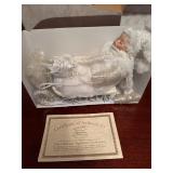 Winter baby porcelain doll