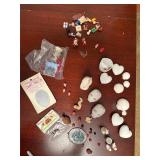 Miniature figurines and unpainted ceramics