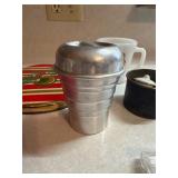 Vintage measuring cup, cake candles
